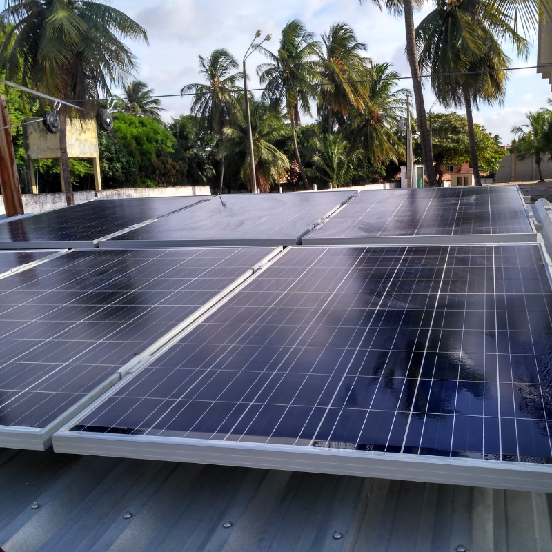 Solar panels on a villa rooftop in Sosúa, Dominican Republic.