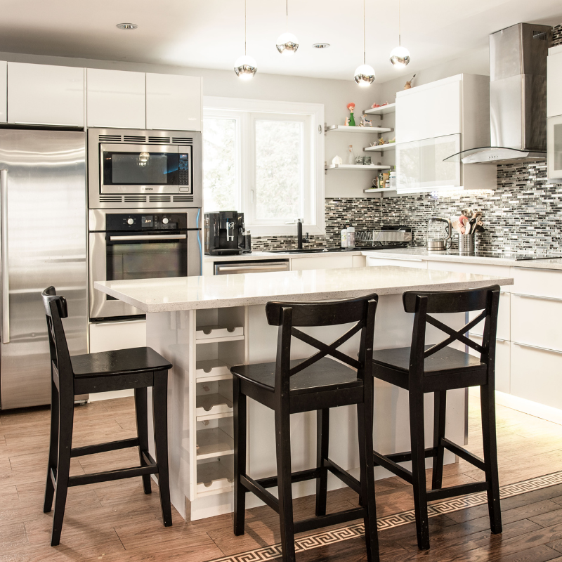Modern remodeled kitchen with new cabinetry and lighting in a Sosúa villa.