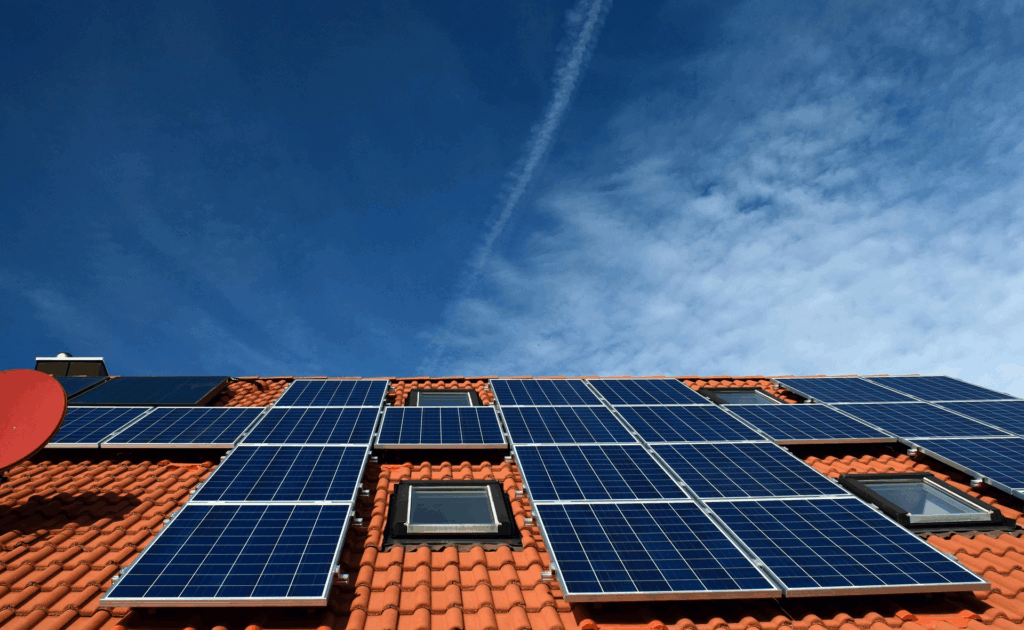 Solar panels installed on a modern rooftop in Sosúa under tropical sun